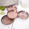 Aged copper drinks coasters and glass