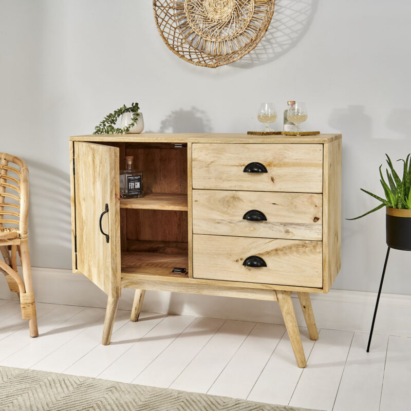 Indoor wooden natural sideboard with open door and drinks