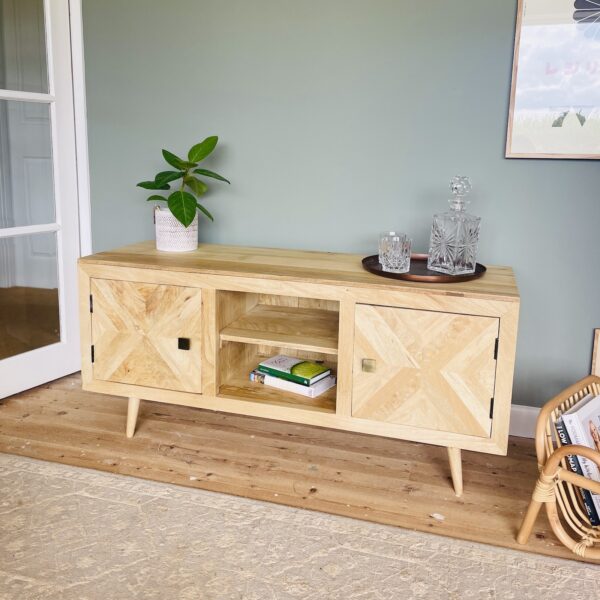 Wooden sideboard hallway with plant