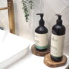 Rustic wood coasters in bathroom with hand soap