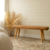 Wicker hallway bench with pampas grass