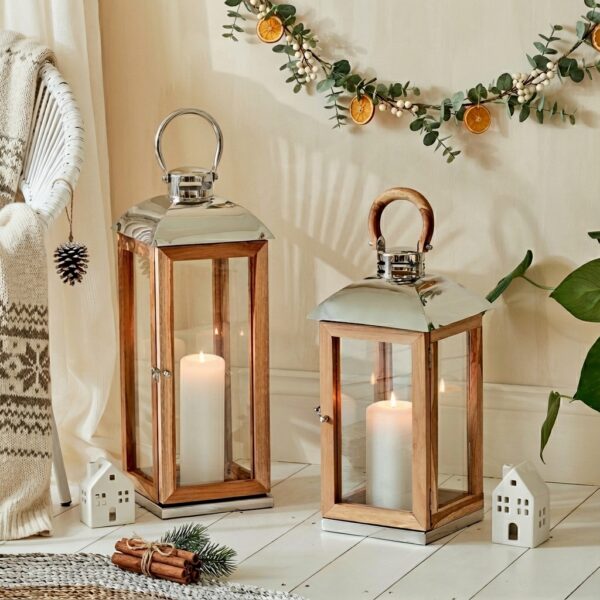 wooden candle lanterns in christmas setting