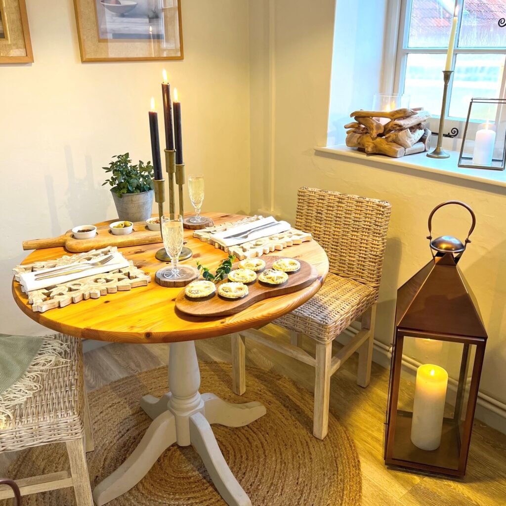 Dining Table and Chairs with Candle Holder, place settings and lantern