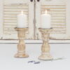 Whitewashed wooden candlesticks