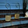 outdoor solar lanterns at night by door