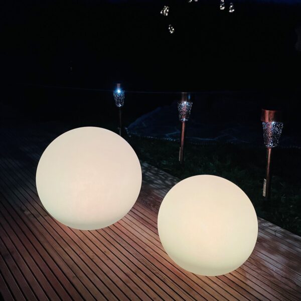 solar powered ball outdoor lighting at night on decking