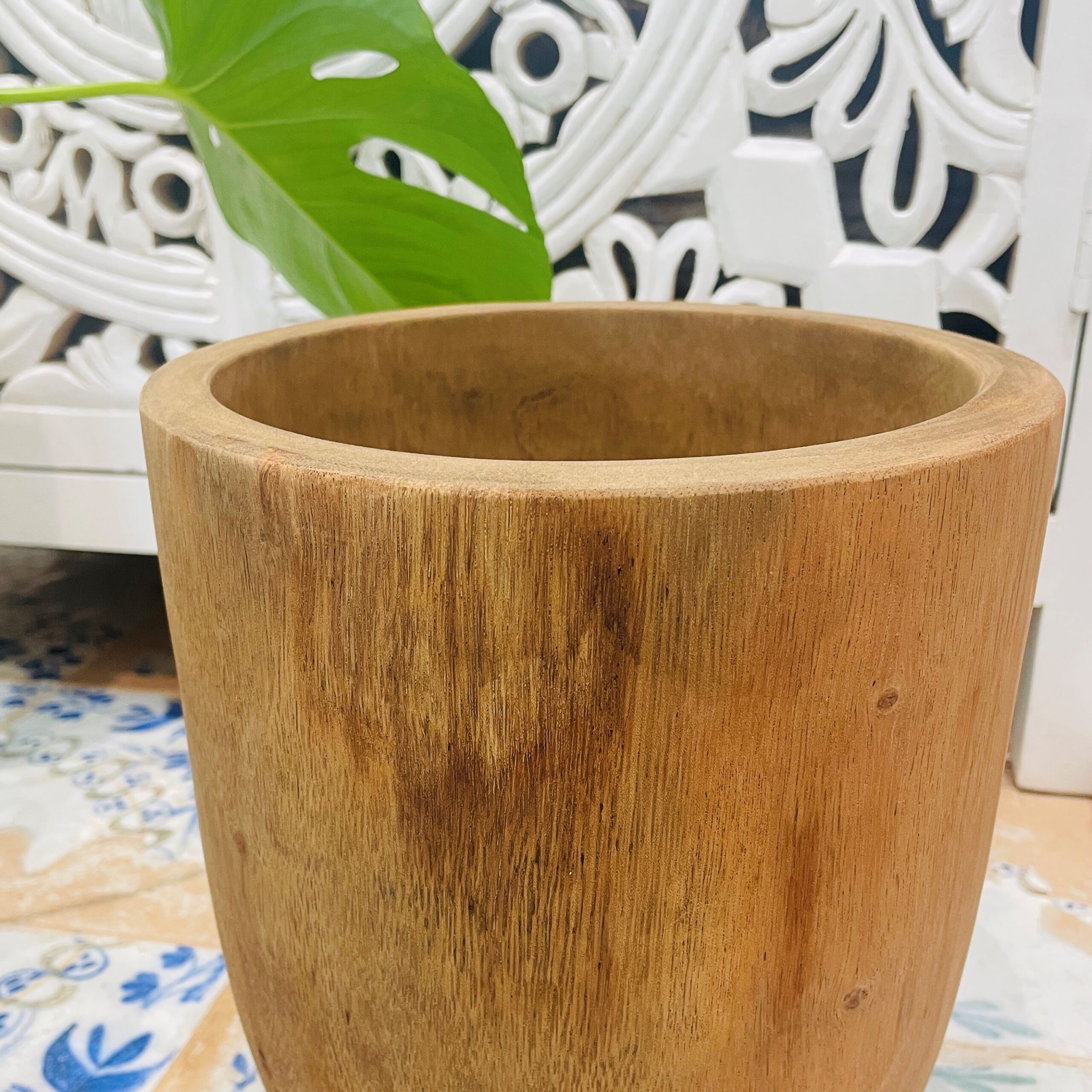 Open wooden pot in bathroom