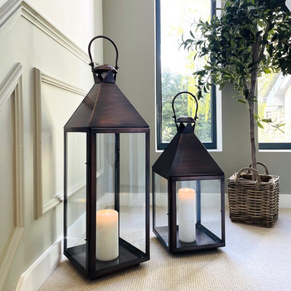 Aged Copper Lanterns on a landing with a small tree