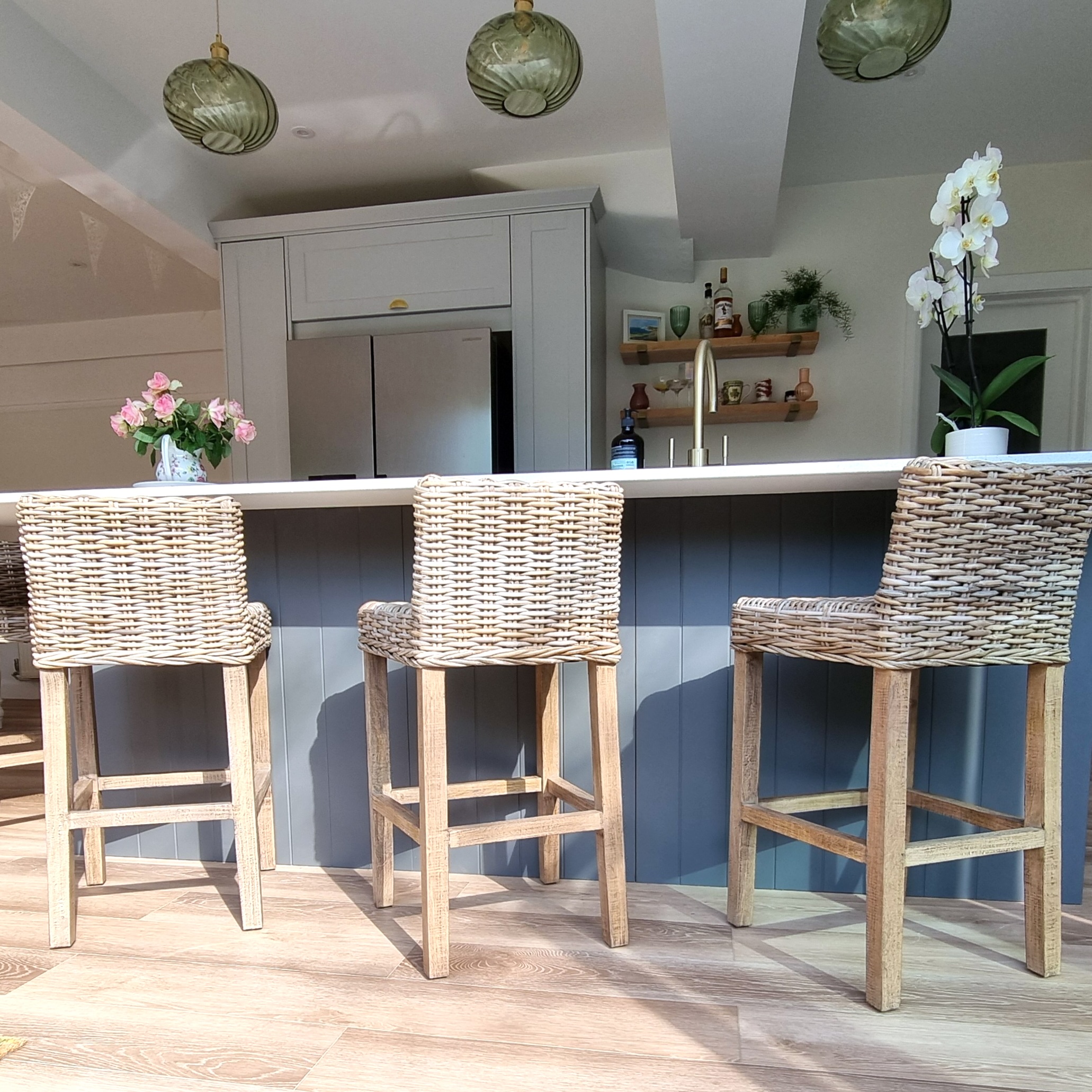 rattan bar stools in customer kitchen