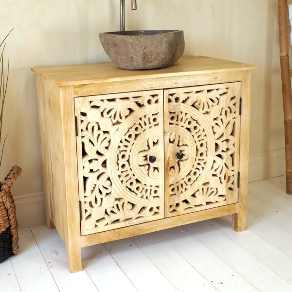 Natural carved vanity unit with stone sink on white wooden floor