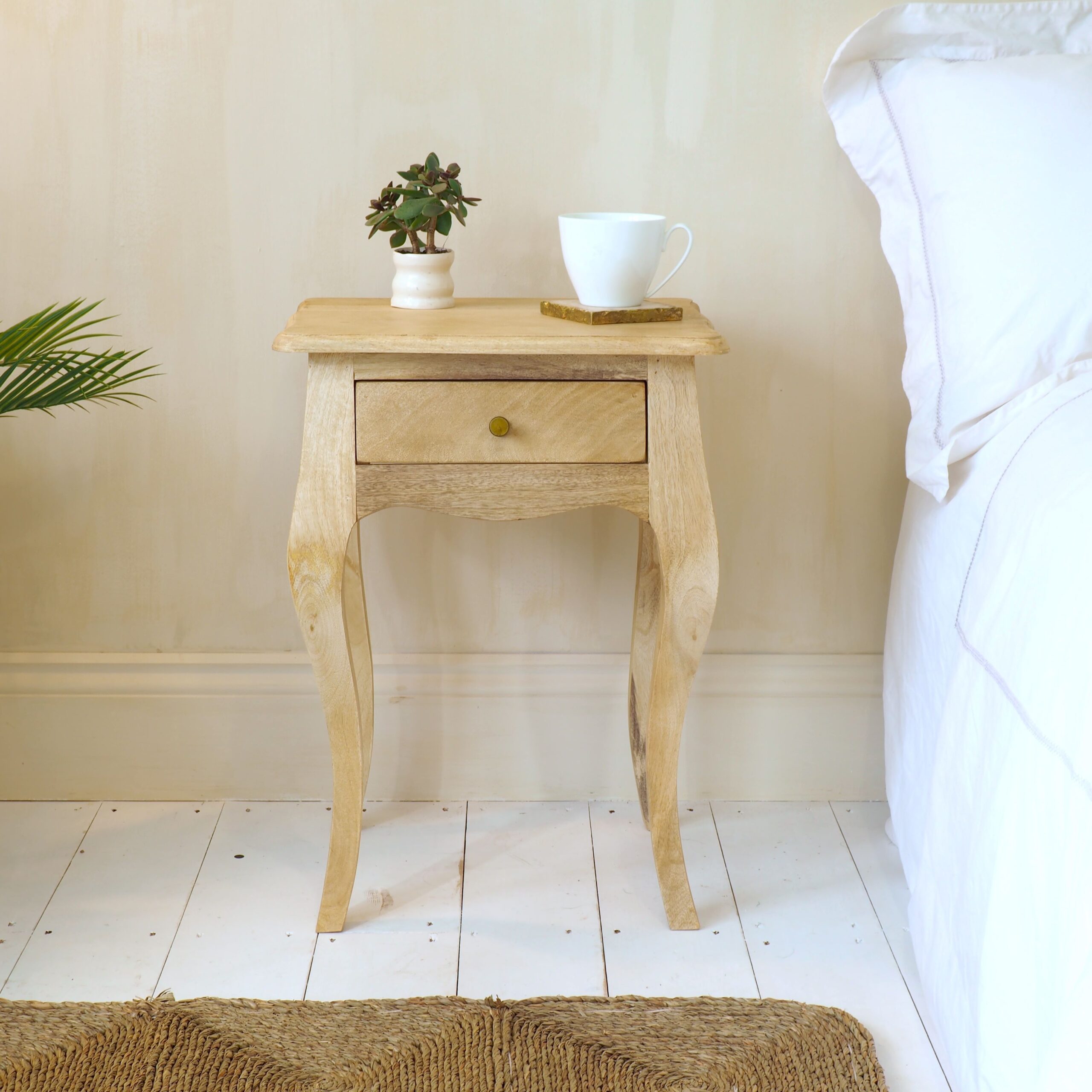 Natural Bedside Table face on, on white wooden floor in bedroom setting