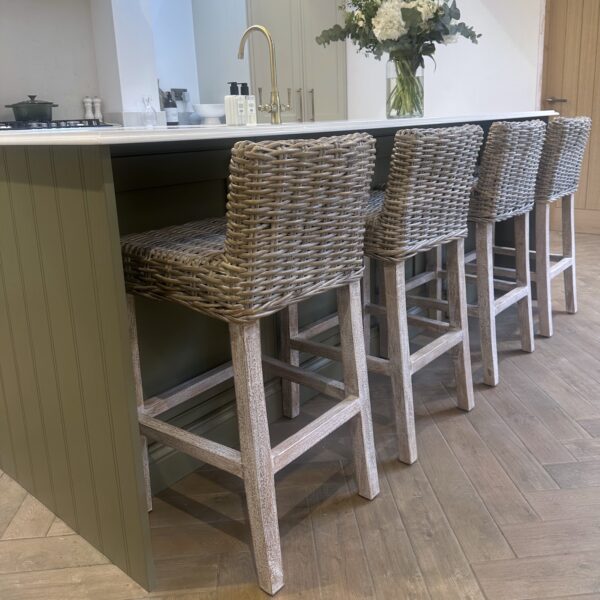 rattan bar stool at kitchen island