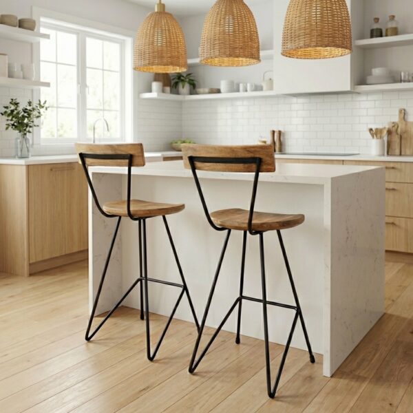 metal kitchen stools at kitchen island with hanging wicker lights